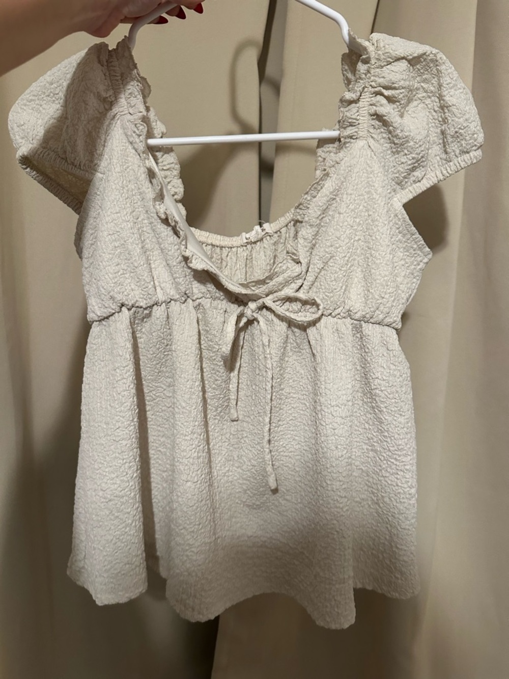 Textured Cream Puff-Sleeve Tie-Front Peplum Blouse